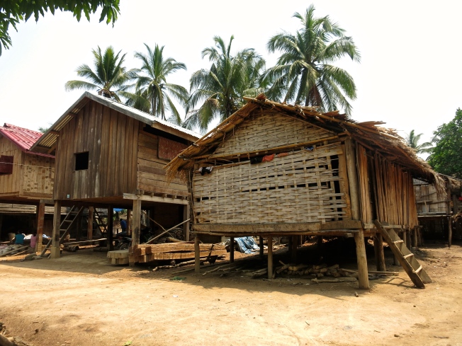 Lao house on the left, Khmu house on the right